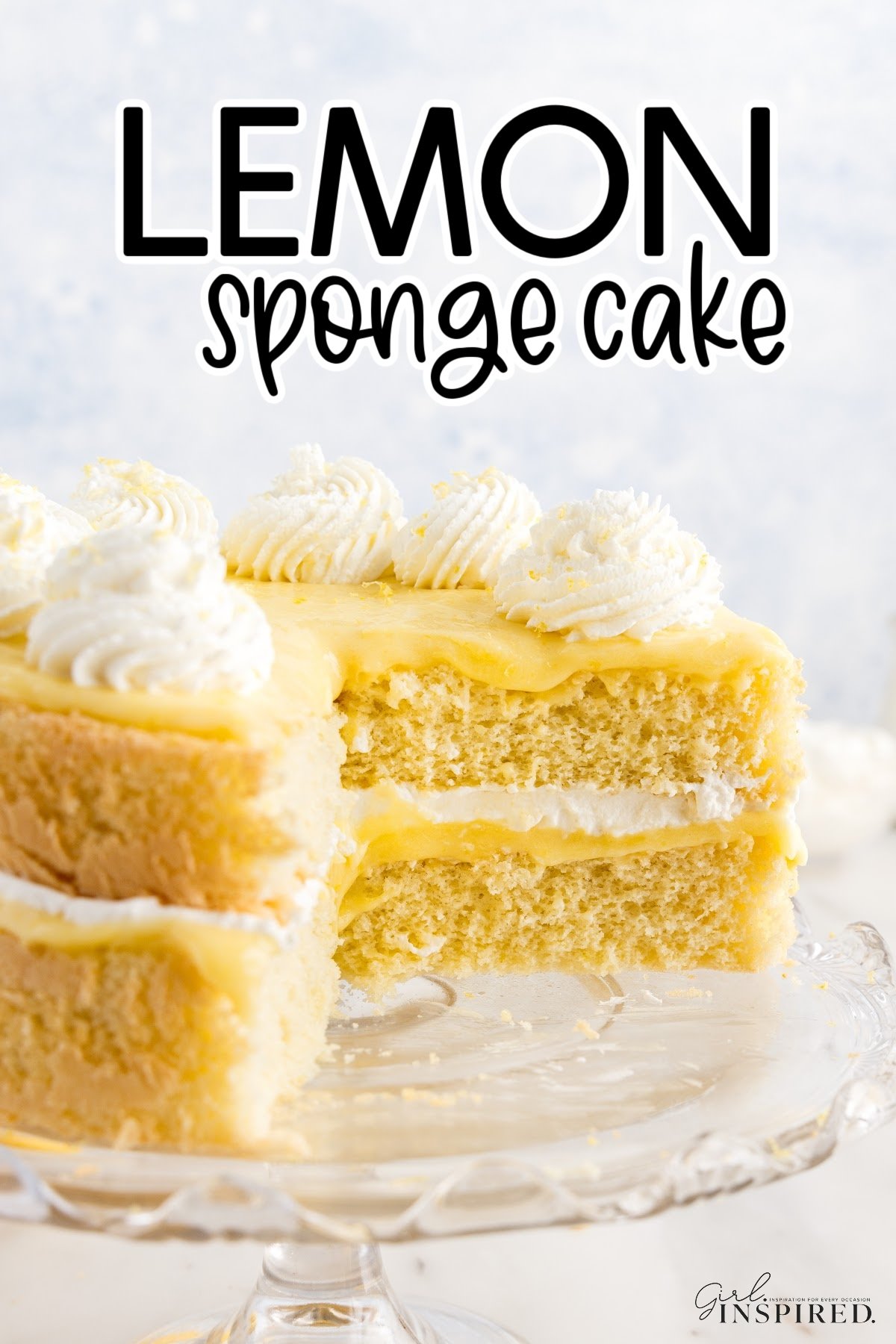 Lemon Sponge Cake with slices missing with text overlay.
