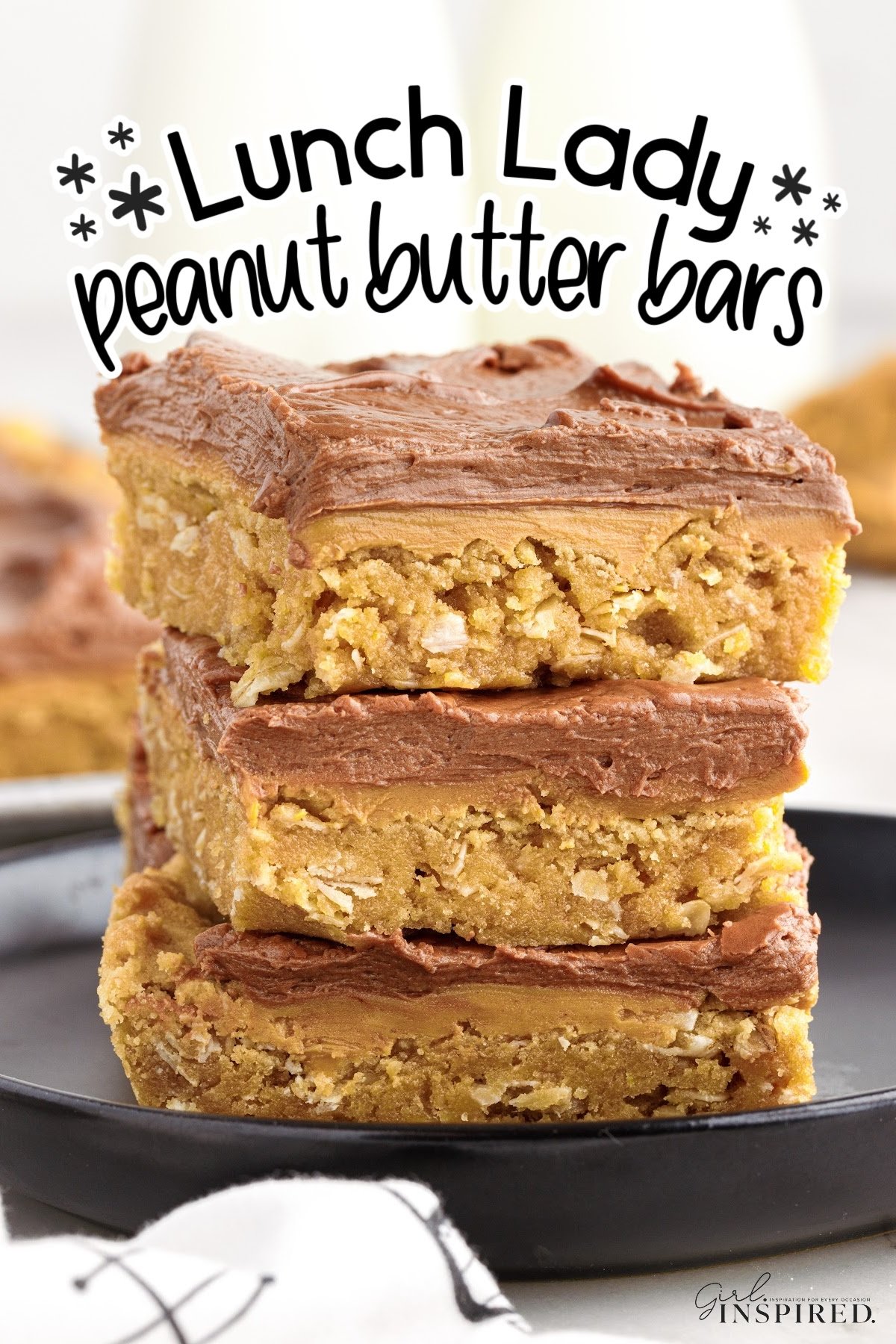 Three Lunch Lady Peanut Butter Bars stacked on each other with text overlay.