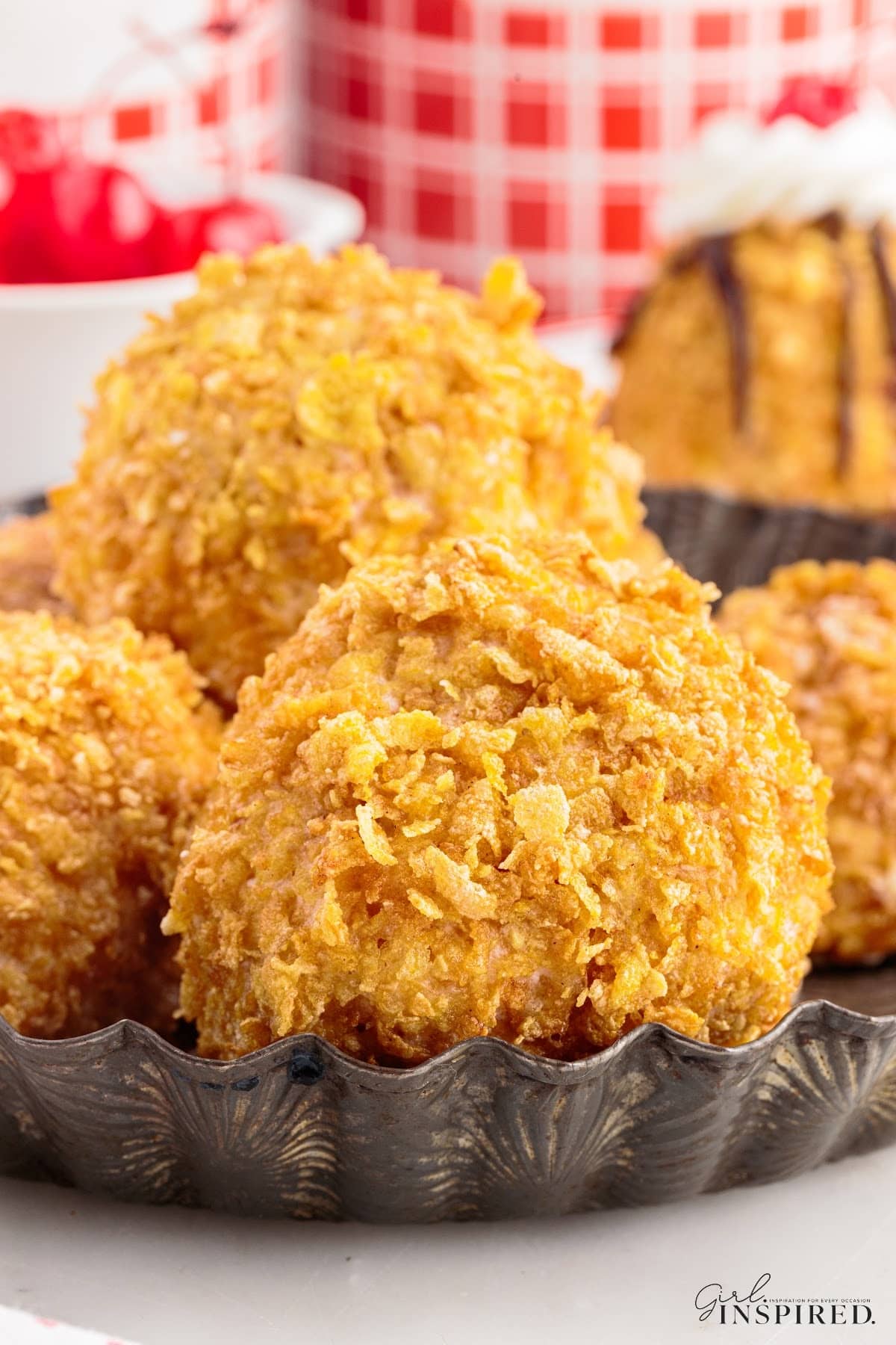 3 Deep fried ice creams in a serving tray.