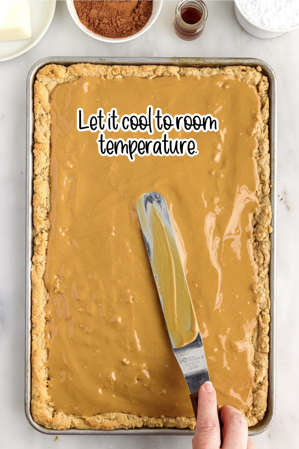 Peanut butter added to Lunch Lady Peanut Butter Bars with text overlay.