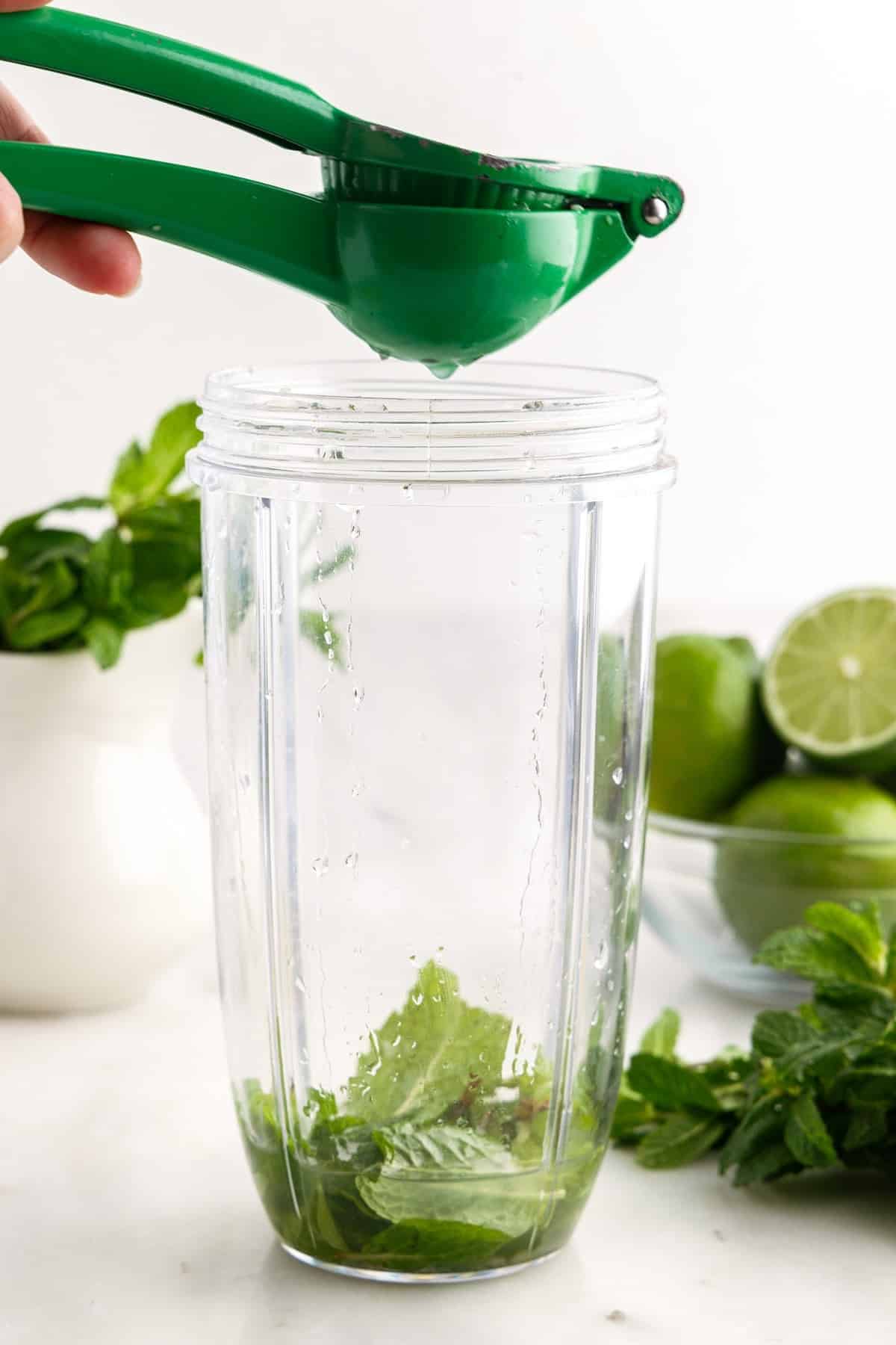 Lime juice squeezed into tumbler.