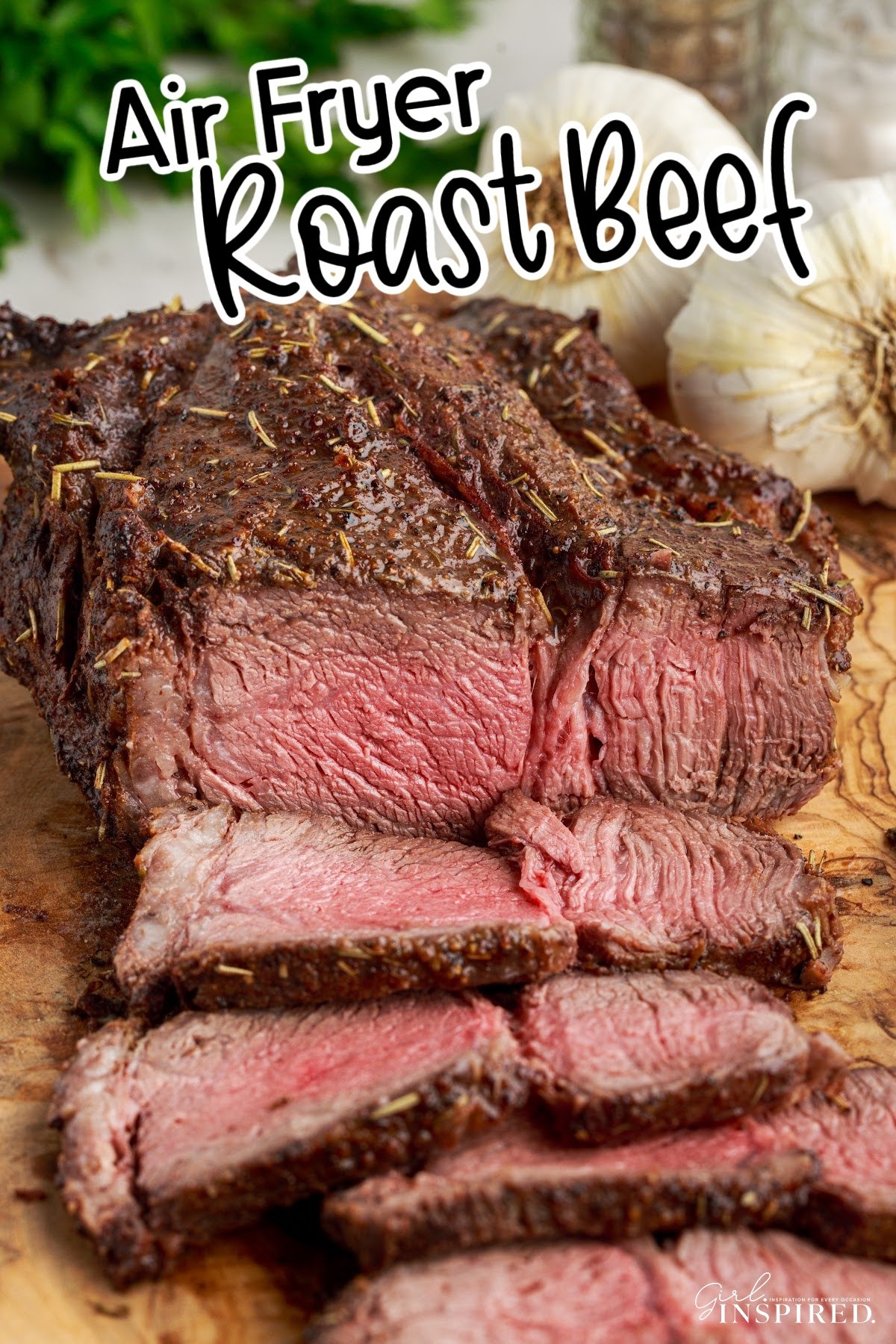 Front view of Air Fryer Roast Beef slices cut from it with text overlay.