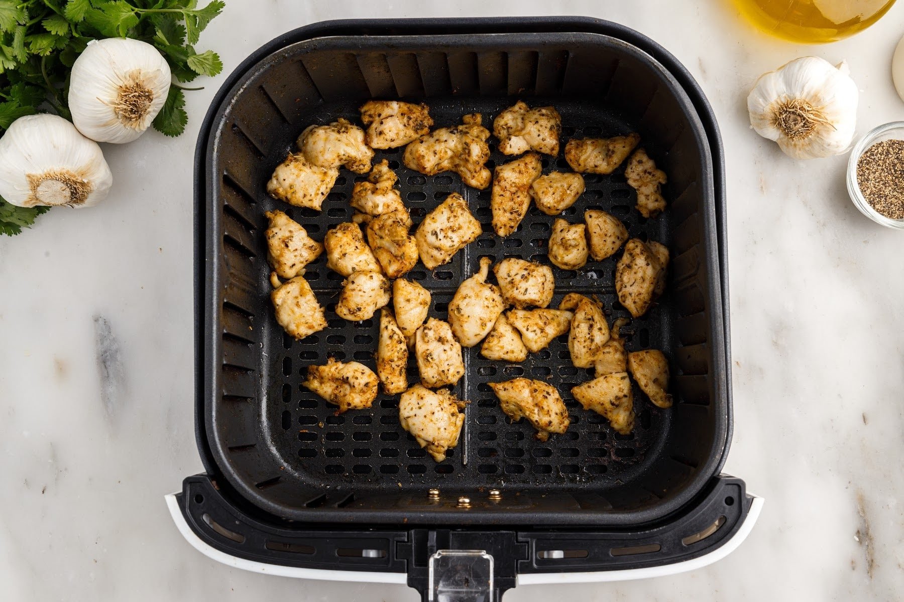 Air Fryer Chicken Bites in an air fryer.