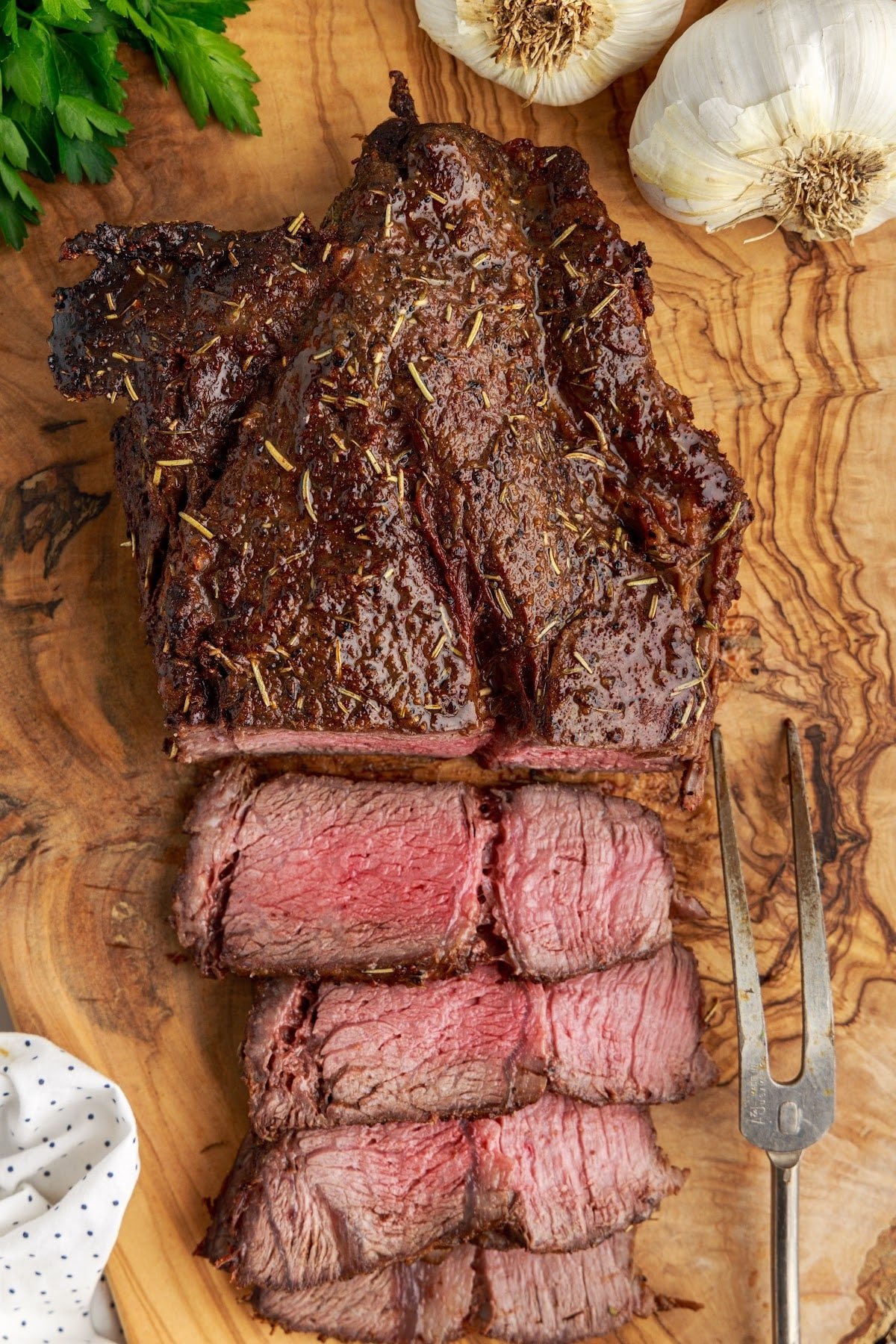 Overhead view of an Air Fryer Roast Beef on a cutting board.