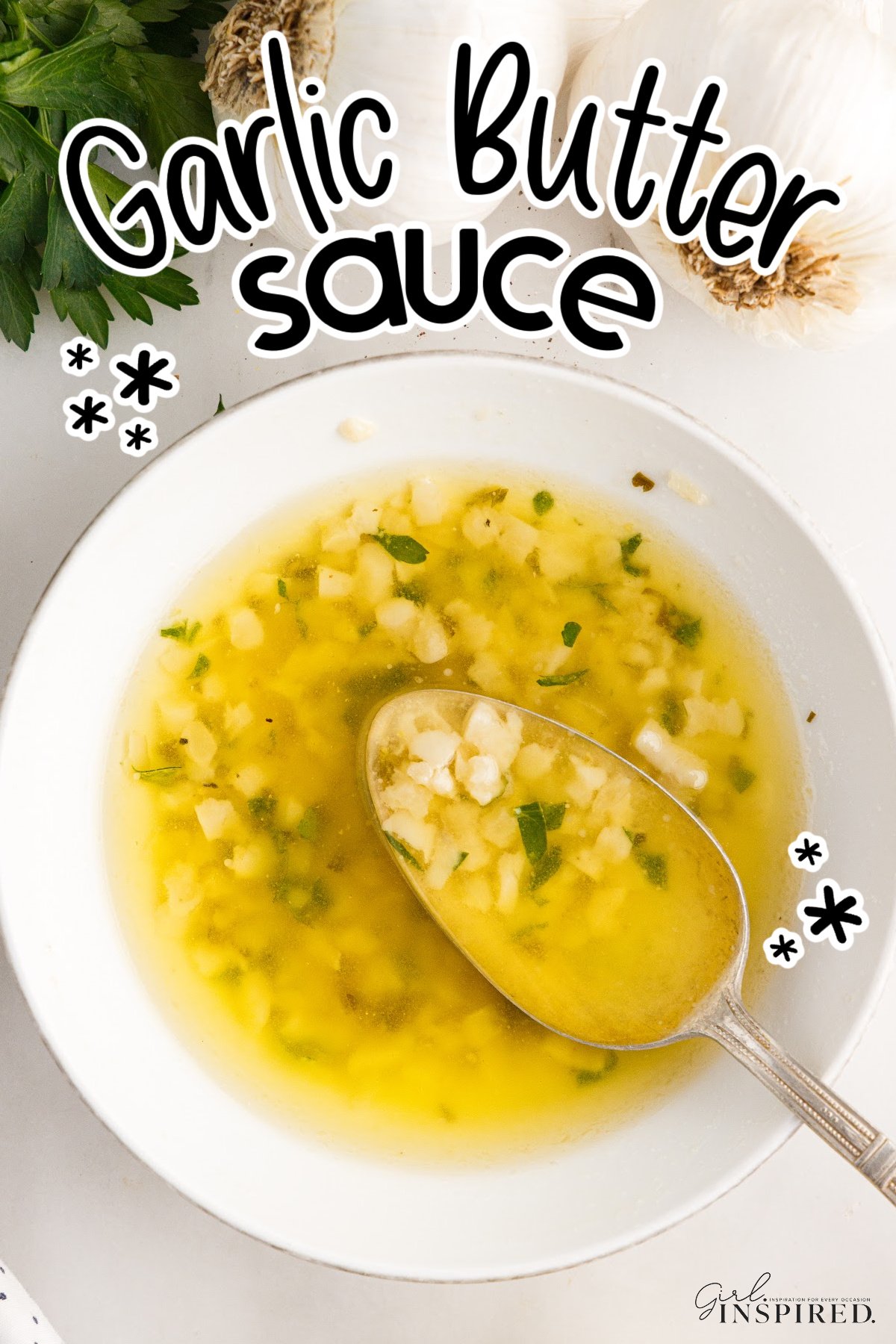 Garlic Butter Sauce in a bowl and some on a spoon with text overlay.