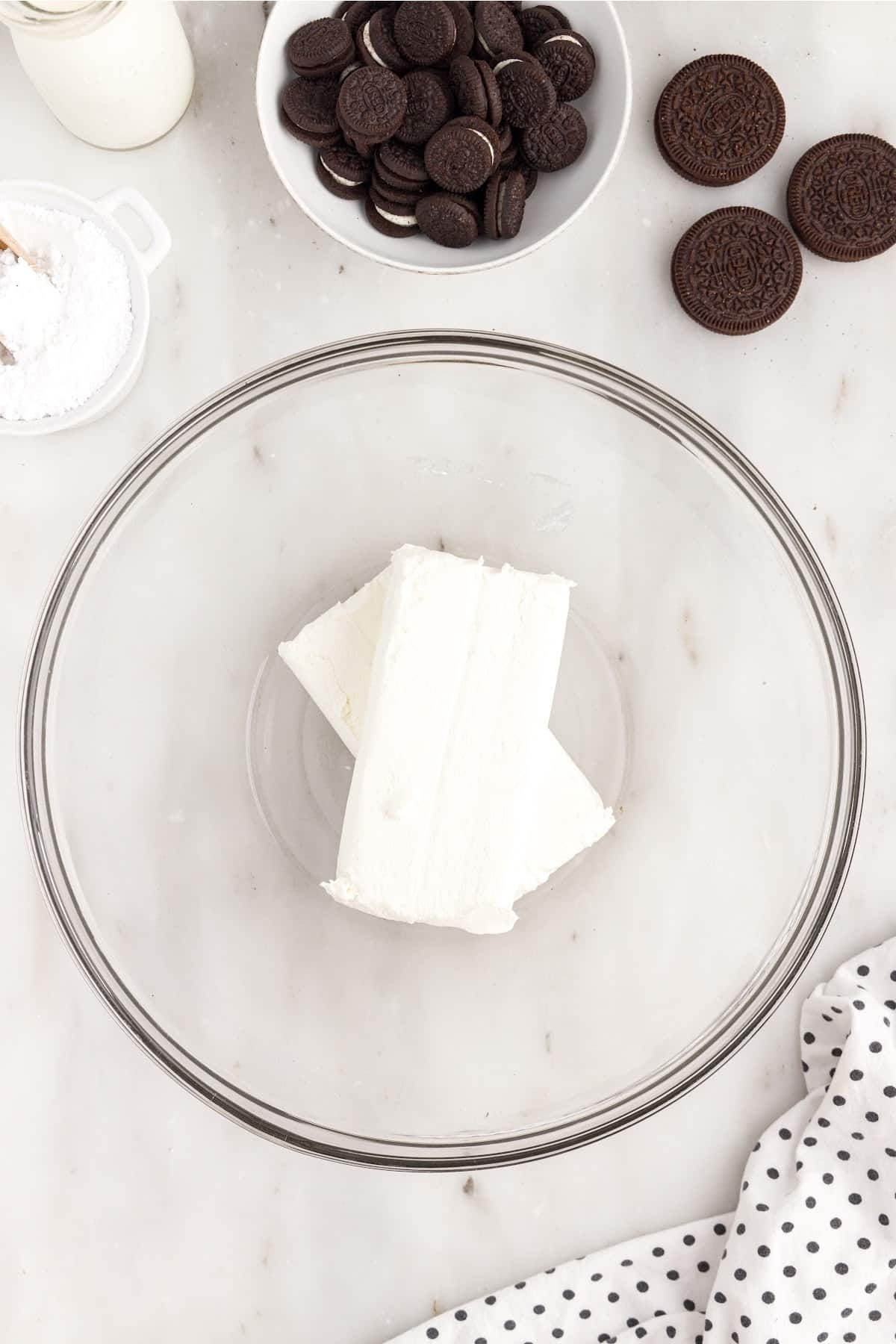 Cream cheese in a mixing bowl.