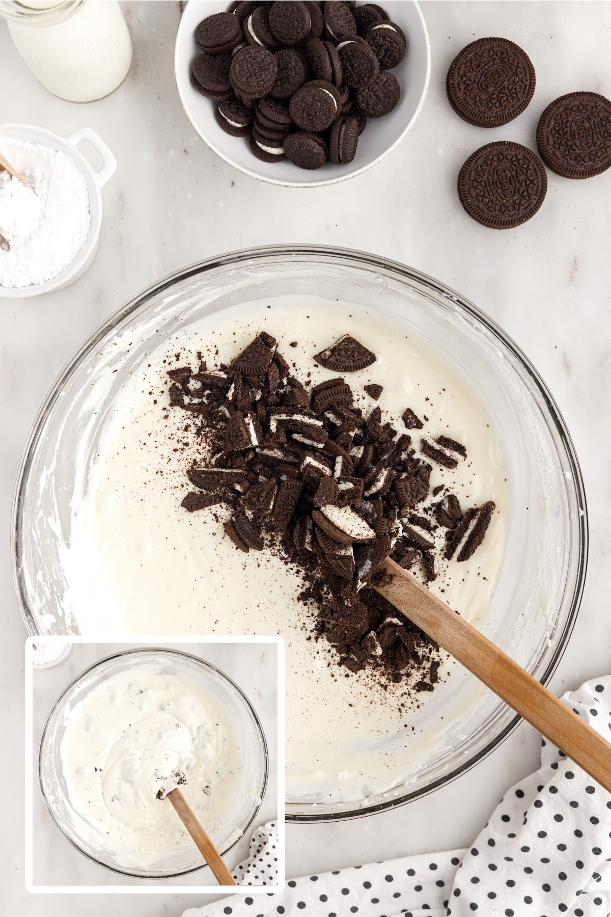 Oreo crumbs added to the top of the mixture and a mixing bowl with the cream cheese mixture with the oreos mixed in.