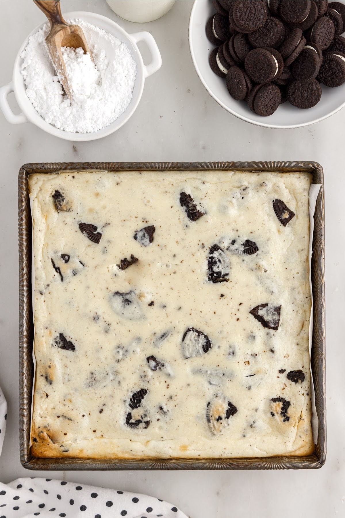 Oreo Cheesecake Bites after being baked in an 8x8.