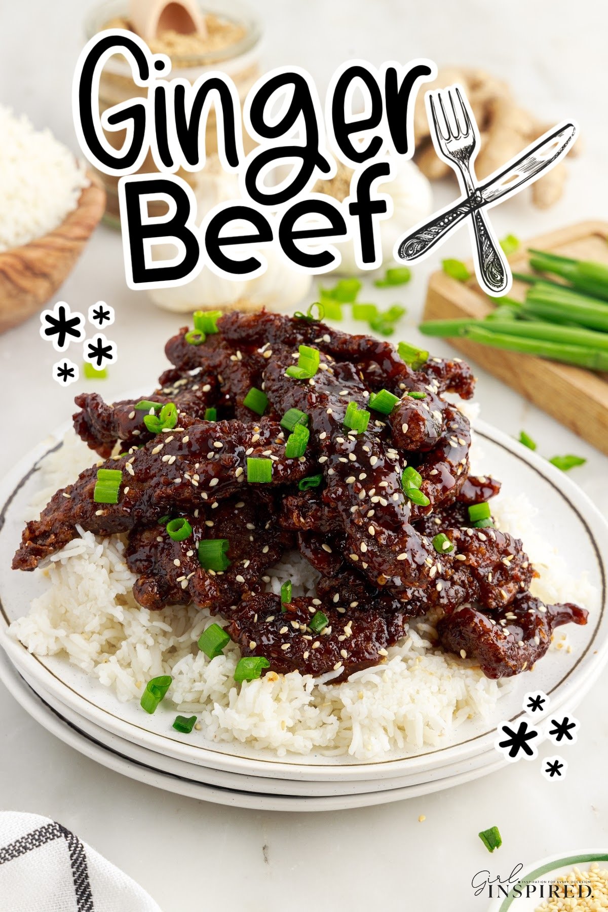 A plate of Ginger Beef over rice with text overlay.