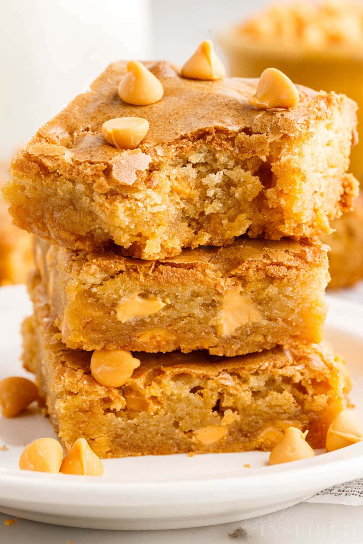 Butterscotch Blondies stacked on each other.