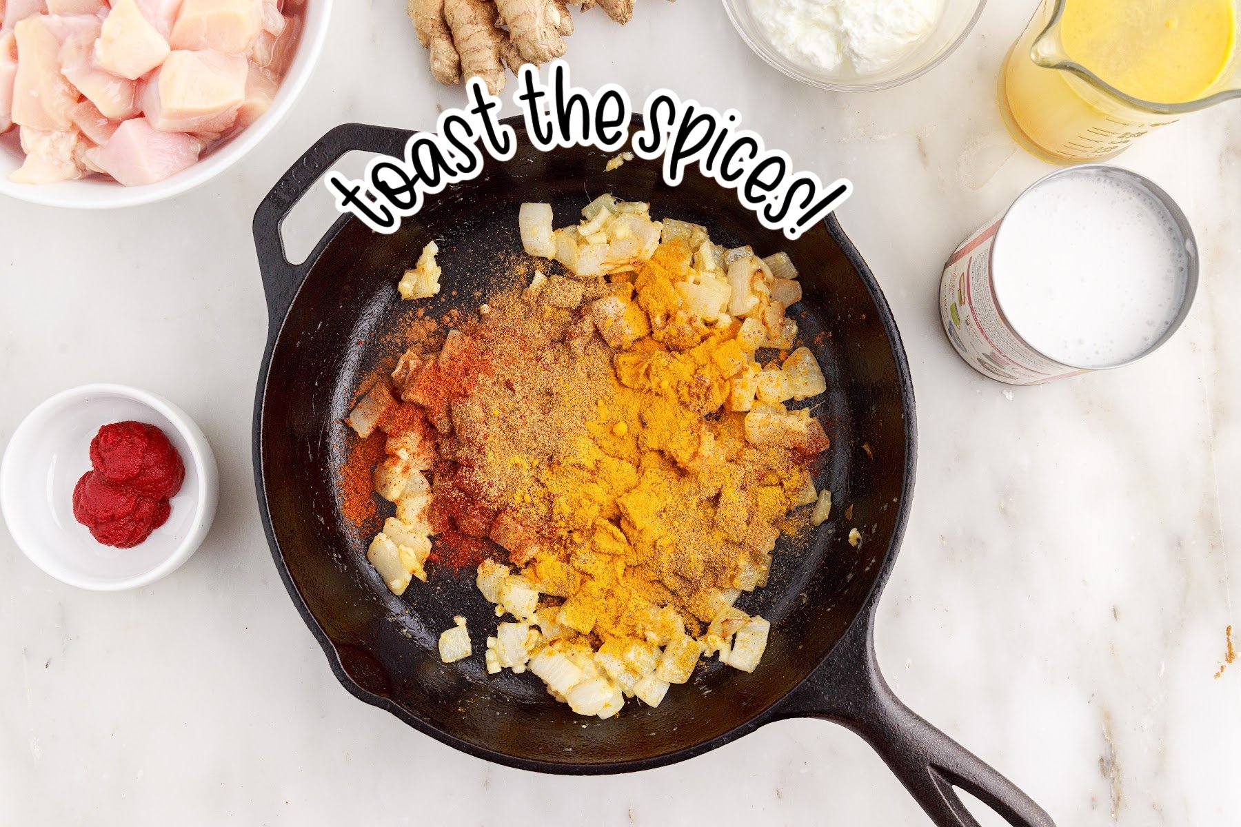 Spices added to onion mixture in a skillet with text overlay.