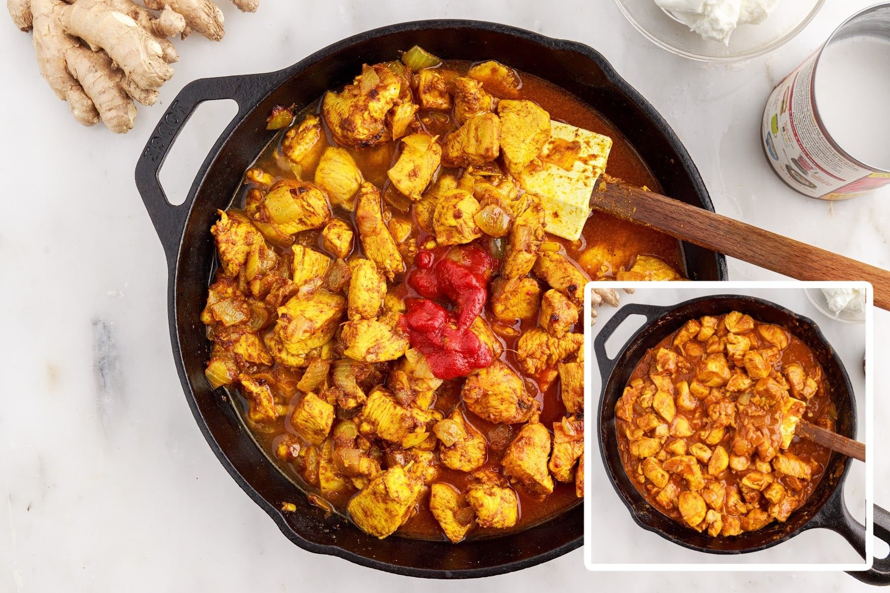 Tomato paste and broth added to the chicken mixture in a skillet and the mixture mixed together.