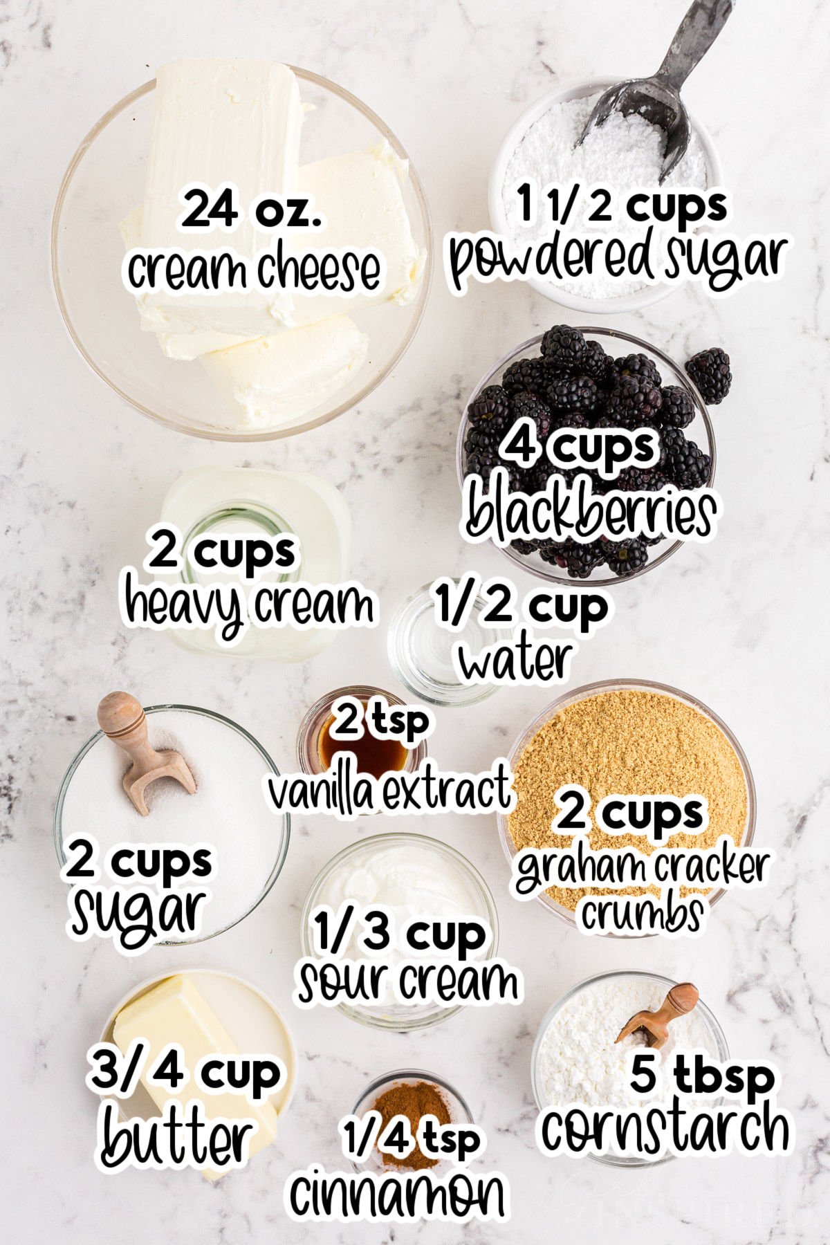 Individual ingredients for the no bake blackberry cheesecake set out in bowls and plates, with text labels.