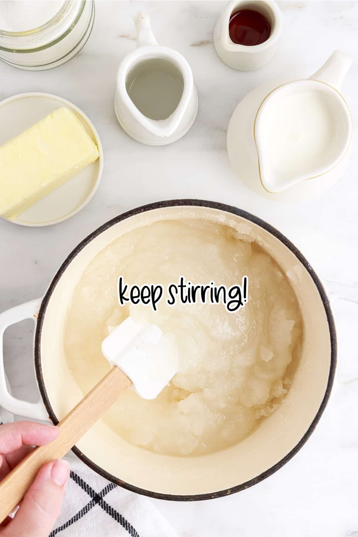 Corn mix mixture being stirred in a pot with a spatula with text overlay.