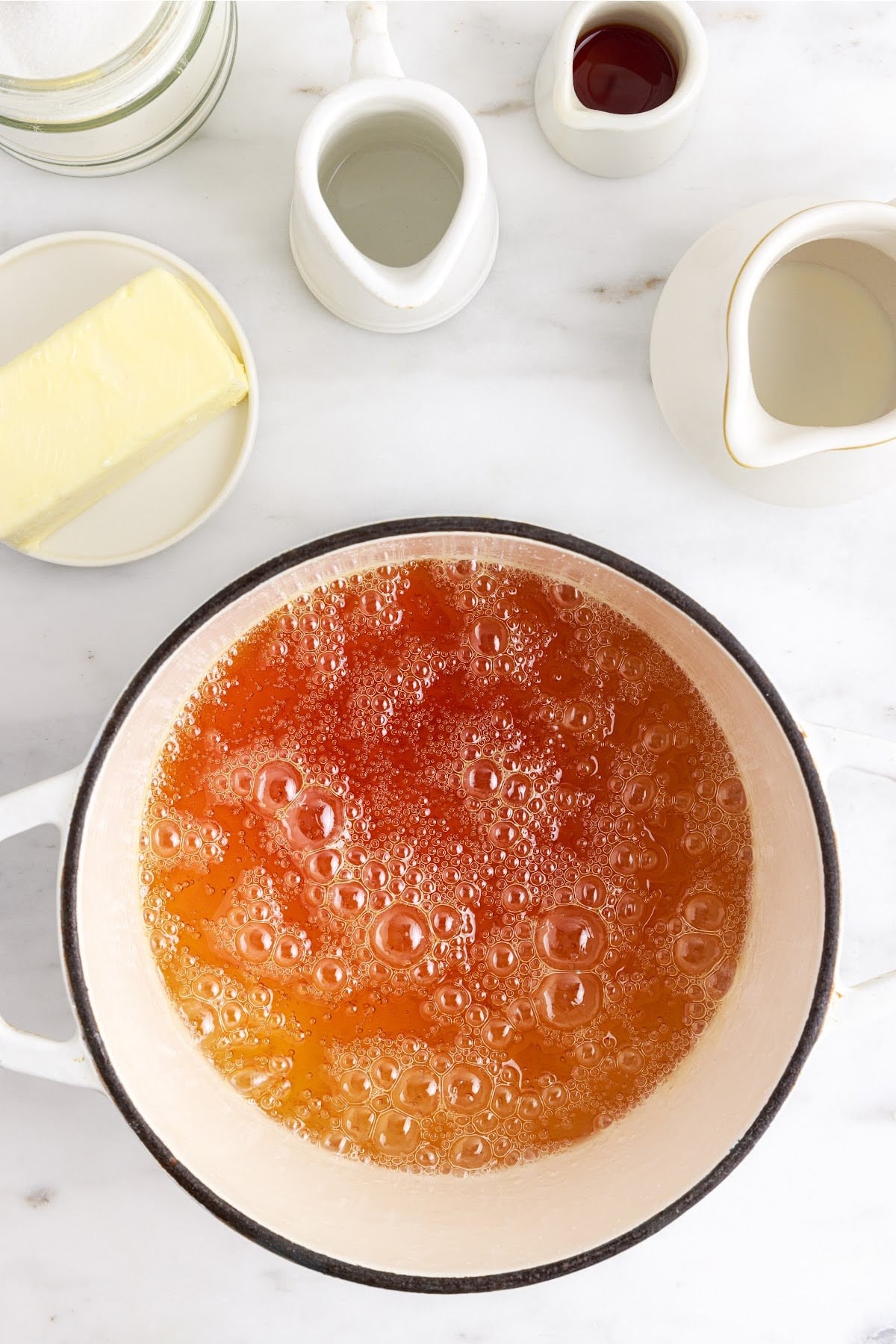 Corn syrup sugar mixture after it has caramelized in a pot.