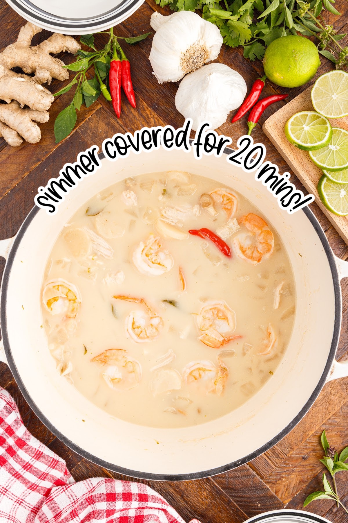Thai Coconut Soup in a pot with text overlay.