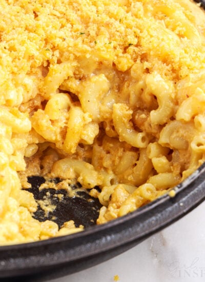 Close up of Smoker Macaroni and Cheese with a serving missing.