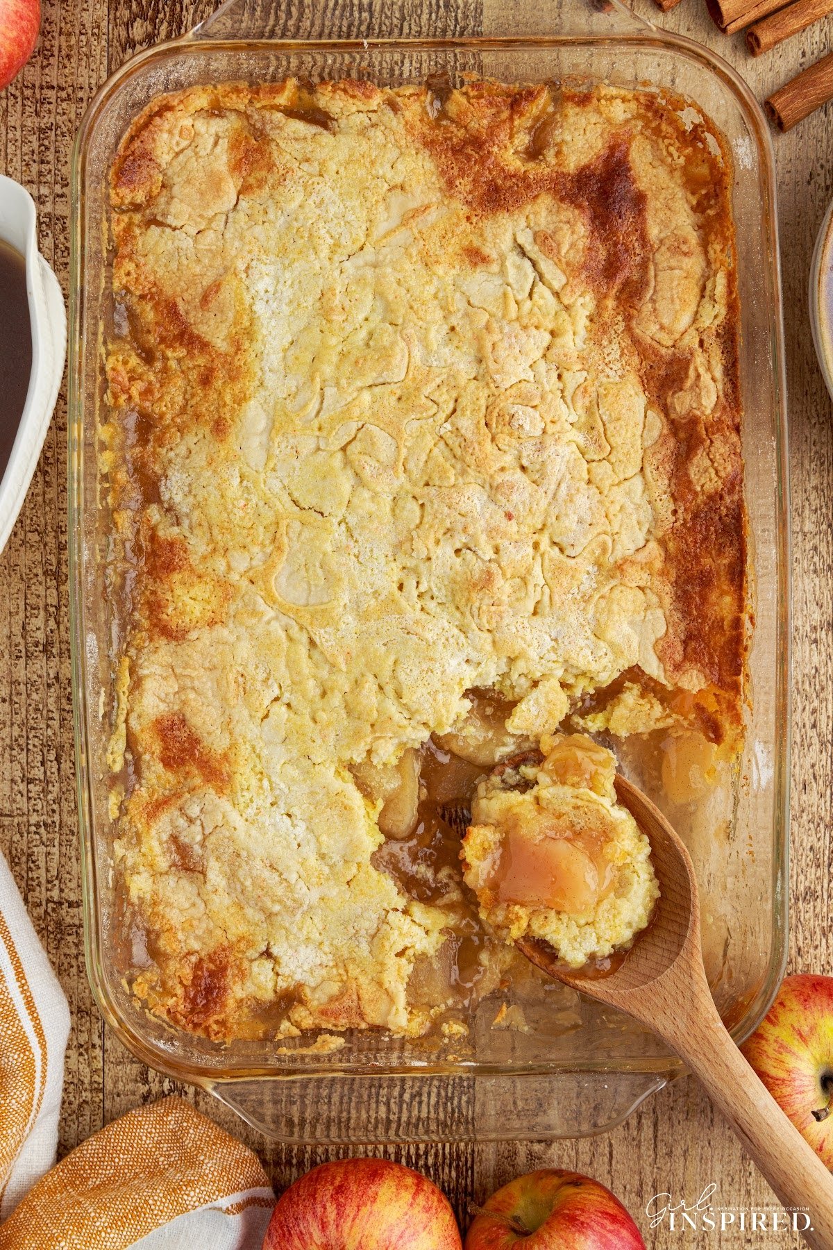 Overhead view of Apple Pie Dump Cake with a serving missing.