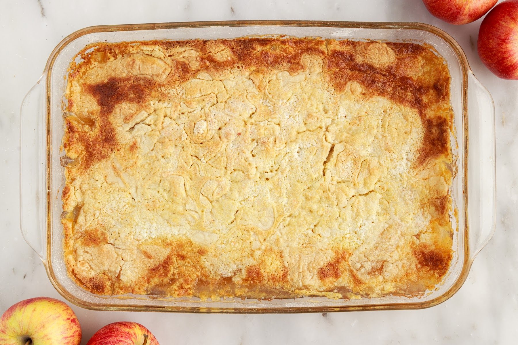 Overhead view of Apple Pie Dump Cake in 9x13 after being baked.