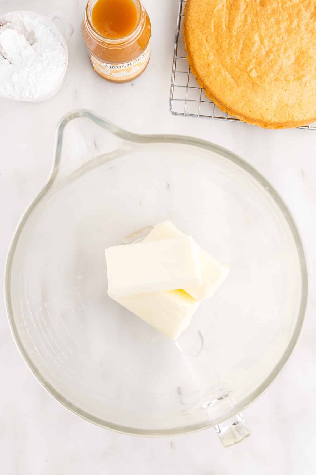 Butter in a mixing bowl.