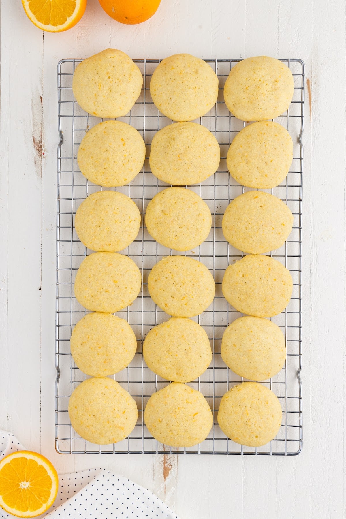 Orange Cookies on a cooling rack.
