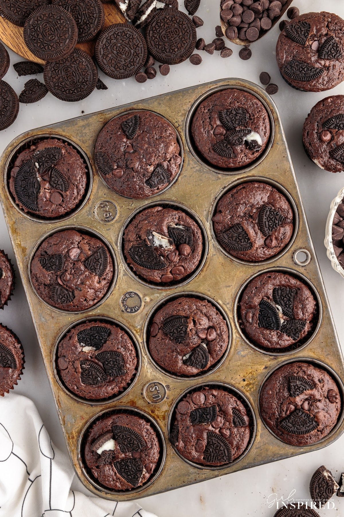 Overhead view of Oreo Muffins in a muffin tin.