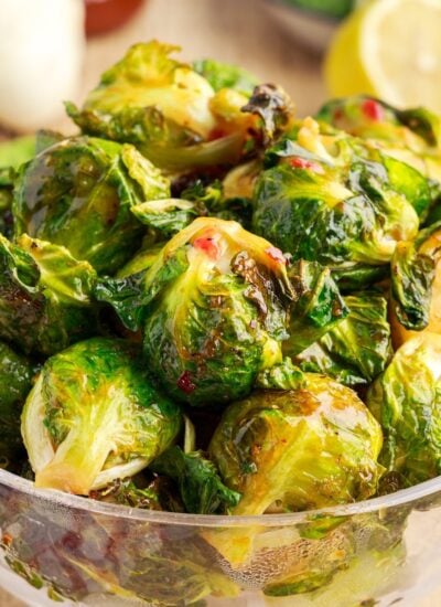 Close up of a bowl of Crispy Air Fryer Brussels Sprouts.