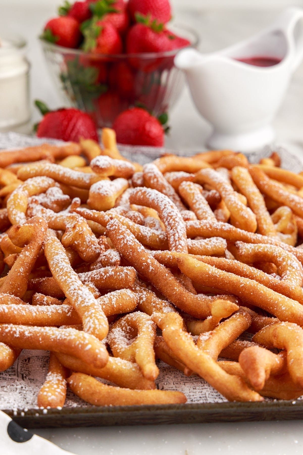 Front view of a platter of Funnel Cake Fries.