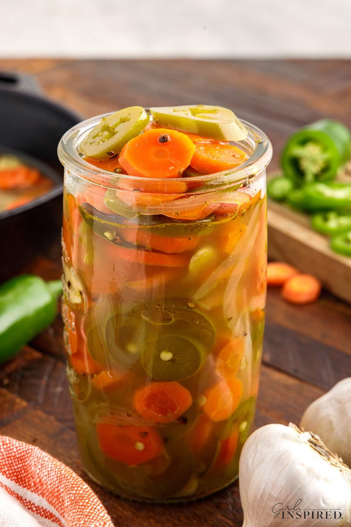 Pickled Jalapeños and Carrots in a jar.