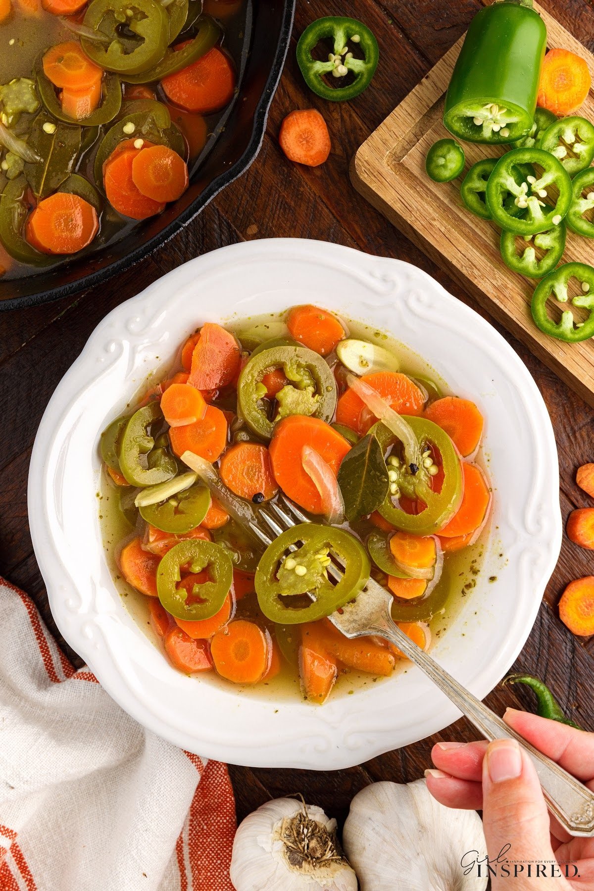 A dish of Pickled Jalapeños and Carrots.