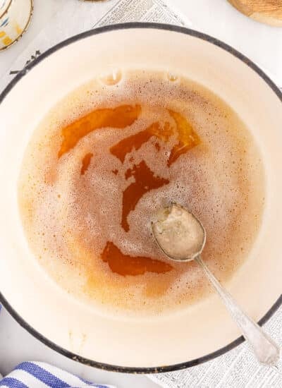 Brown Butter in a bowl with a spoon.