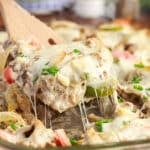 Philly Cheesesteak Casserole on a wooden spoon.