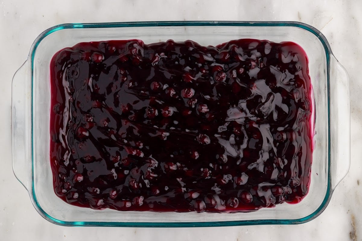 Overhead view of blueberry pie filling.