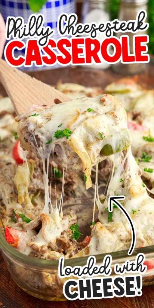 Front view of Philly Cheesesteak Casserole on a wooden spoon with text overlay.