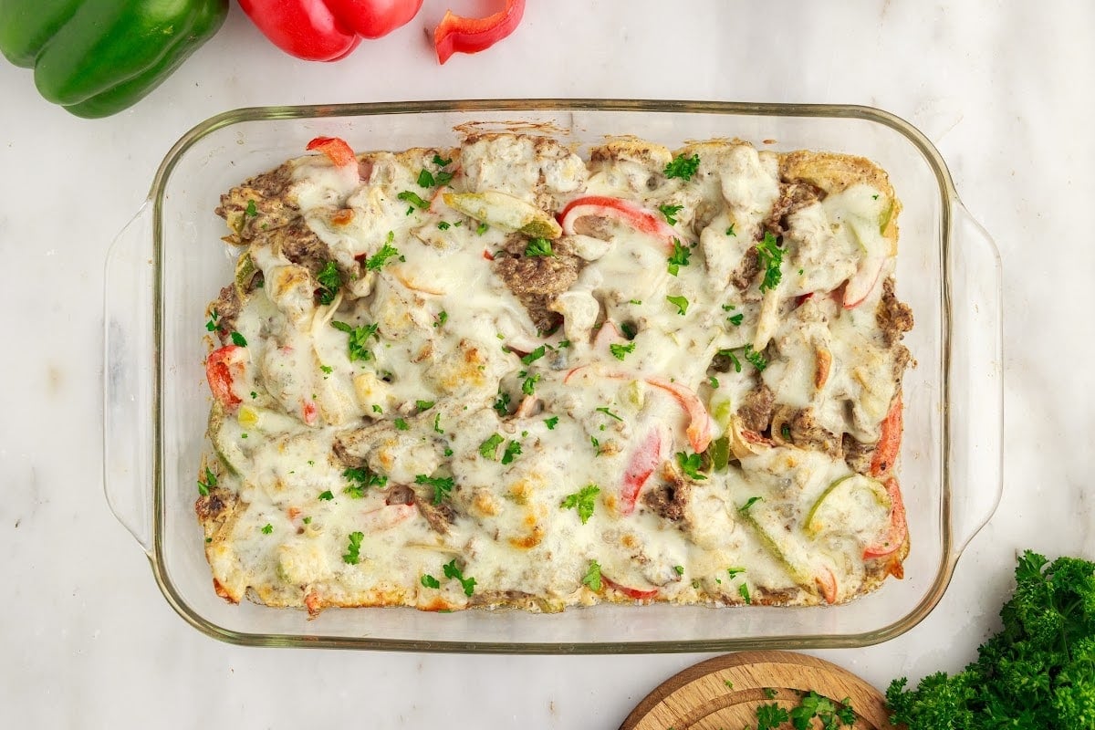 Overhead view of a 9x13 dish of Philly Cheesesteak Casserole.