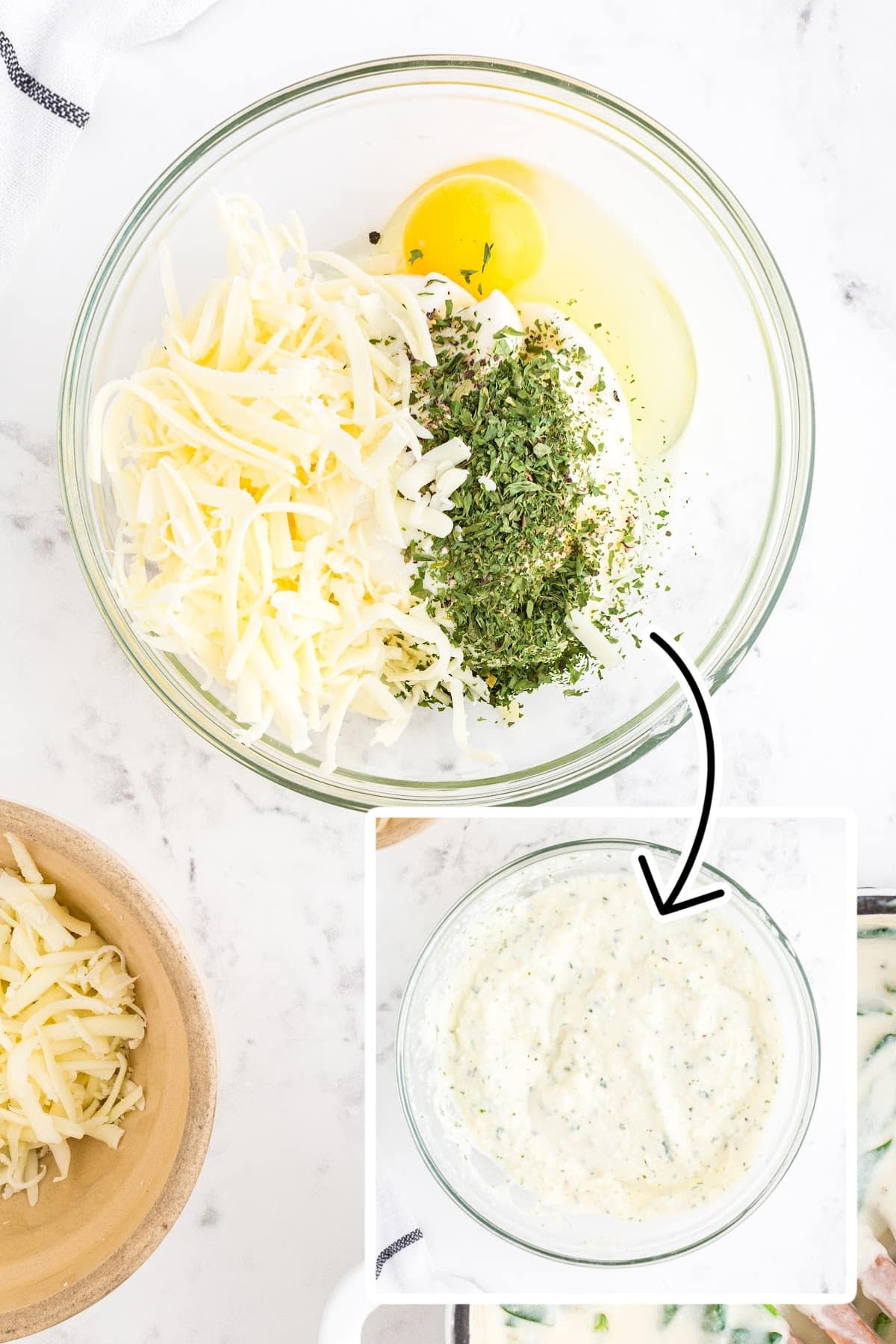 Large bowl of cheese, spices and egg being mixed together.
