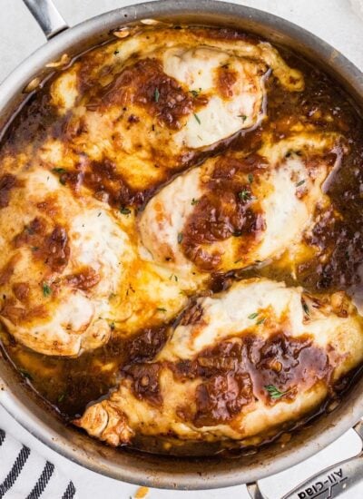 French Onion Chicken Skillet in a pot with broth.
