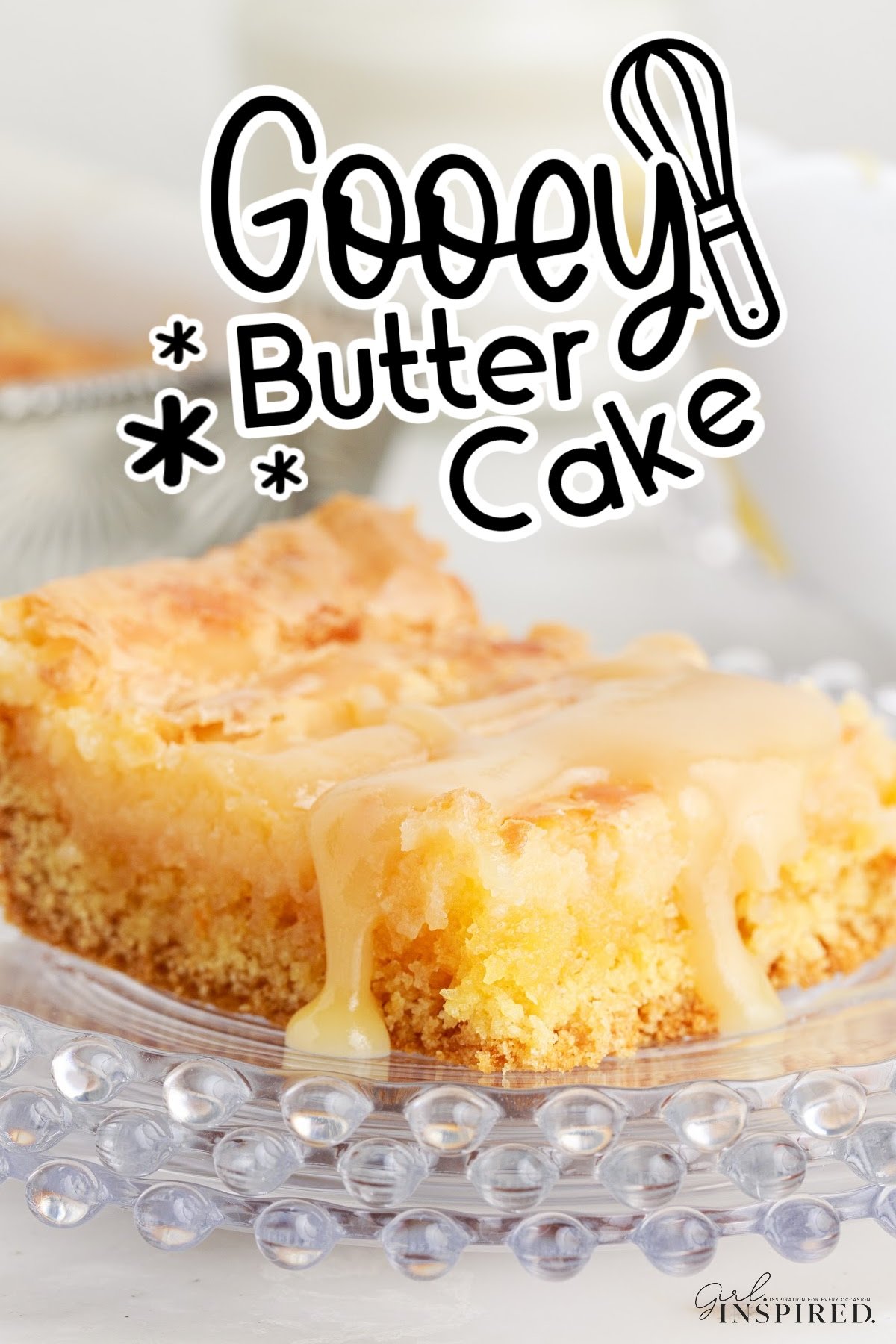 A piece of Gooey Butter Cake with text overlay.