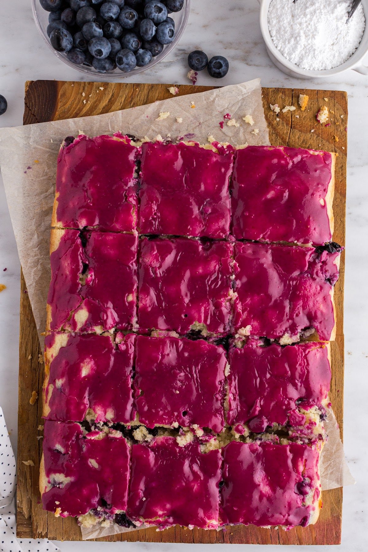 Completed Lemon Blueberry Blondies cut into squares.