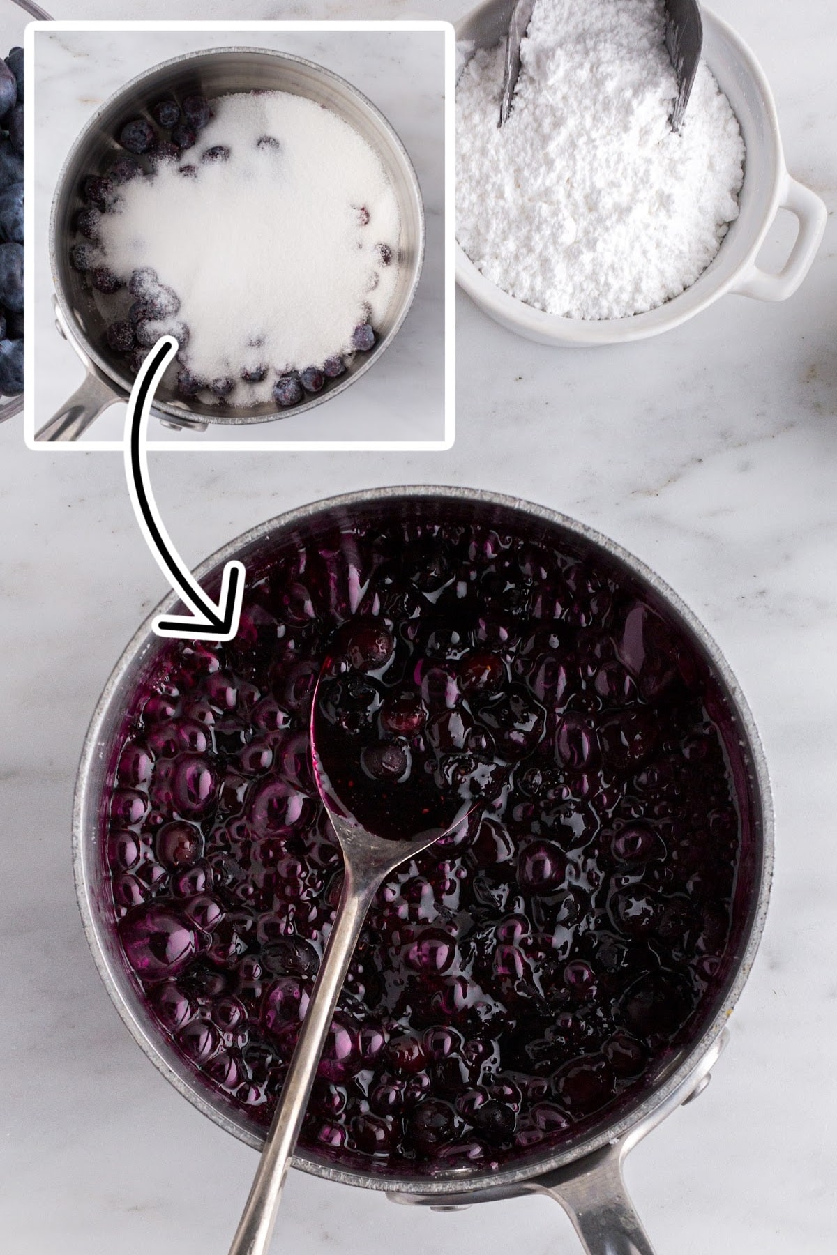 Blueberries in a pan to make the glaze.