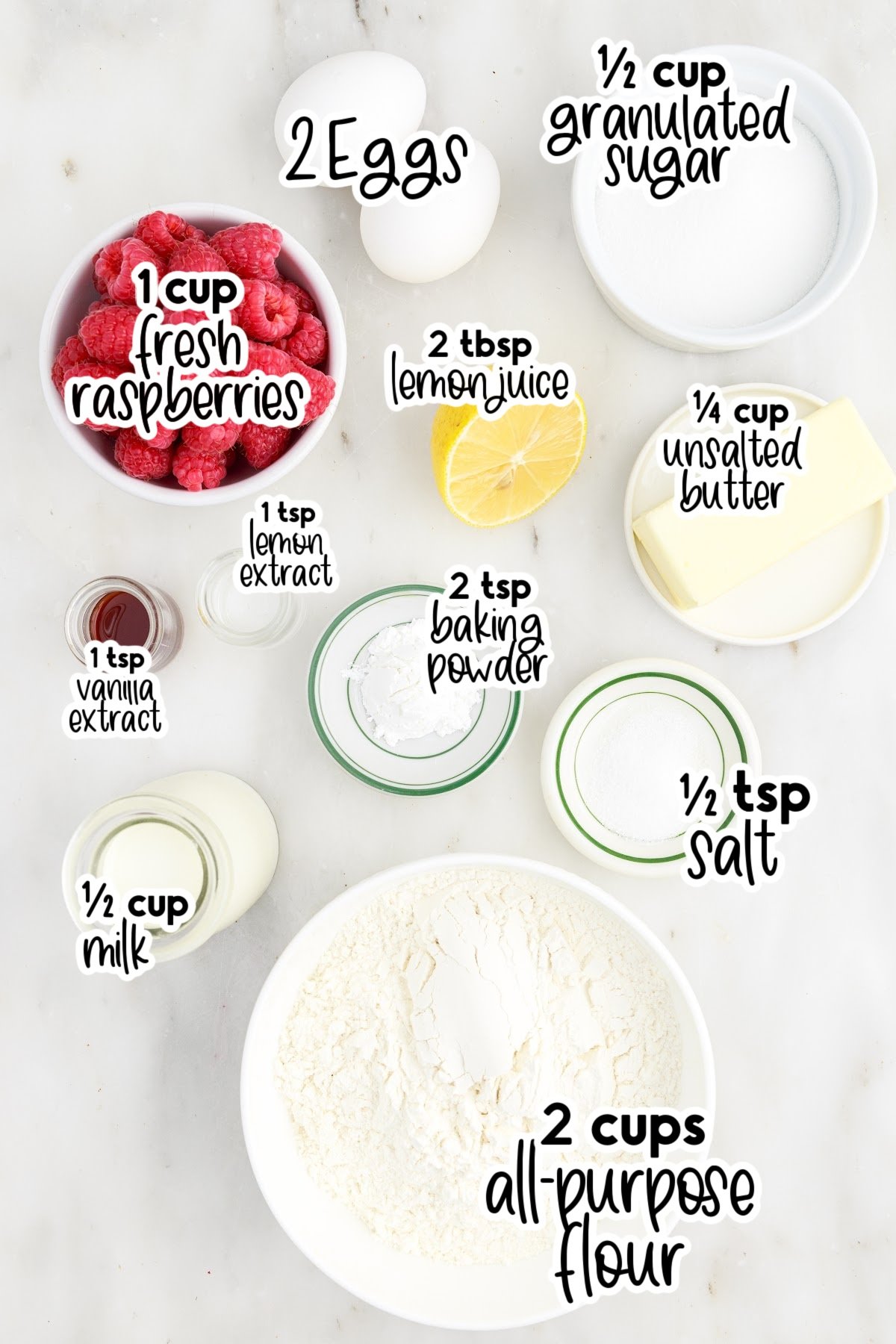 Individual ingredients in bowls and on plates that are needed for lemon raspberry muffins.
