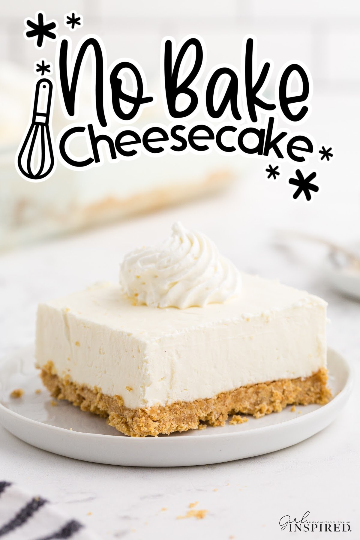 A no bake cheesecake bar on a plate topped with whipped cream with text overlay.