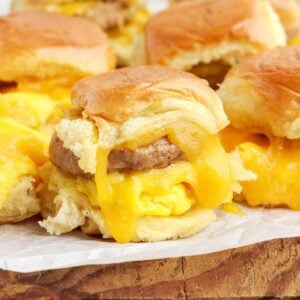 Breakfast Sliders on a cutting board, seperated and ready to serve.