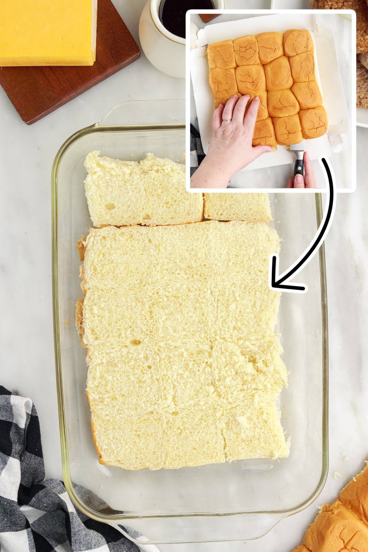 Layed the bottom of the bread rolls into a baking dish.