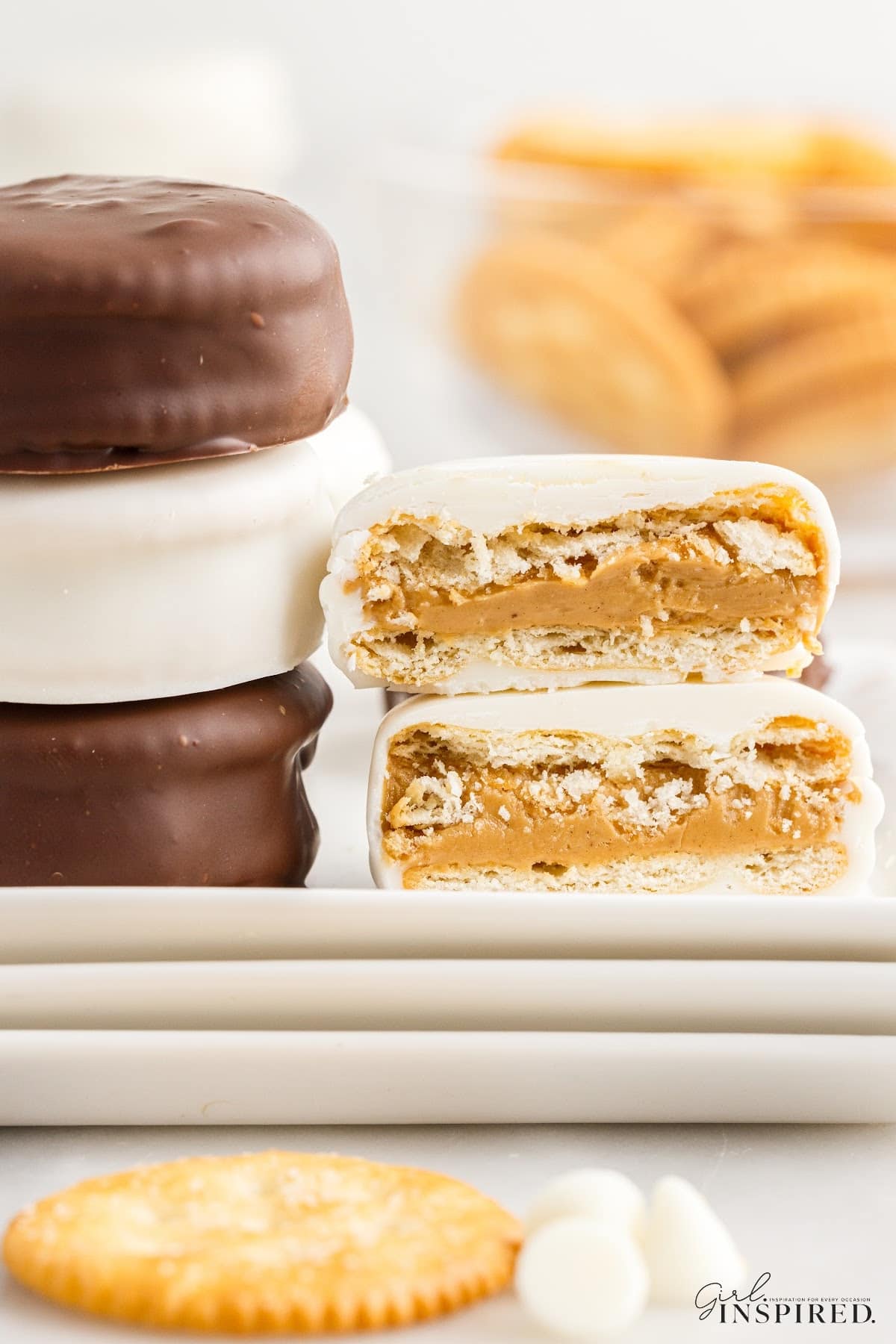 Stacks of Chocolate Dipped Peanut Butter ritz crackers showing the insides, with text overlay.