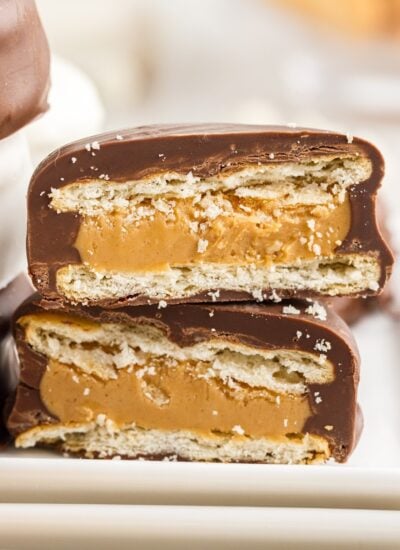 Stacks of Chocolate Dipped Peanut Butter ritz crackers showing the insides, with text overlay.