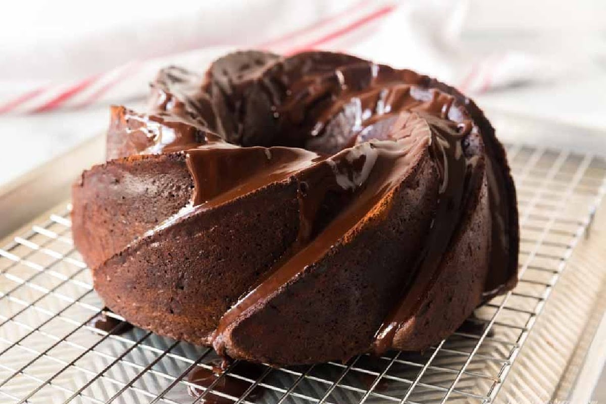 Double Chocolate Fudge Cake on a cooling rack.