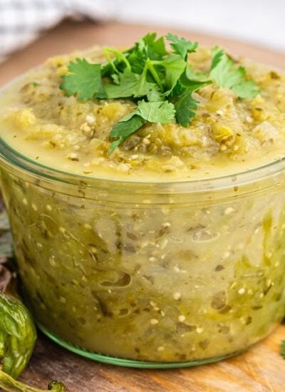 Close up of a jar of Green Enchilada Sauce.