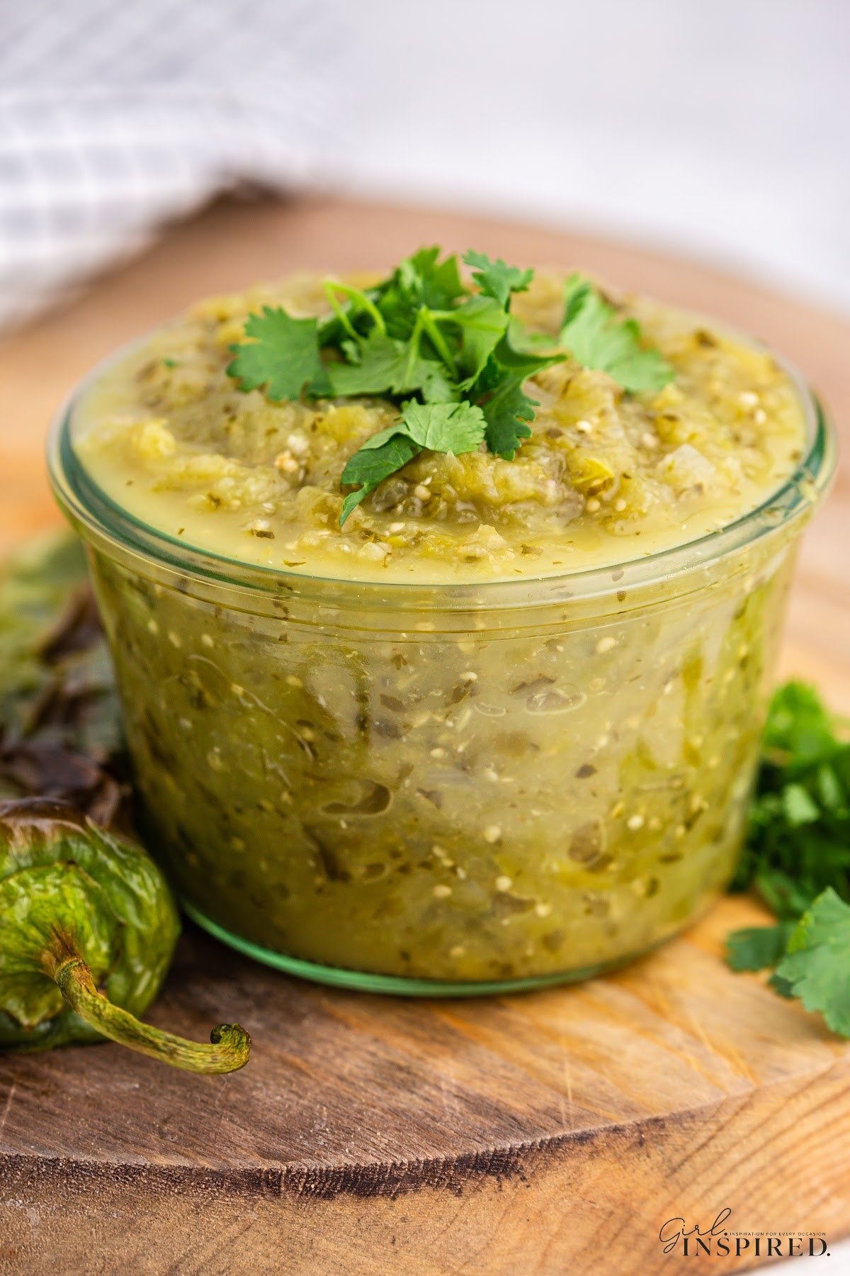 A small glass dish of Green Enchilada Sauce.