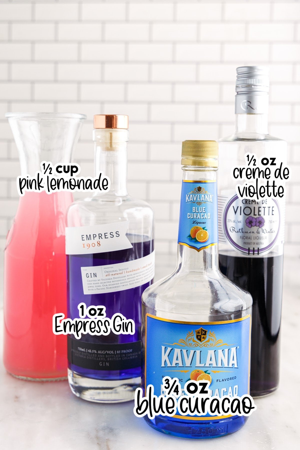 All ingredients to make this cocktail on the counter, with text overlays.